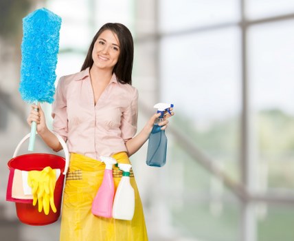 Trusted home cleaners in Barnet vacuuming a family home carpet