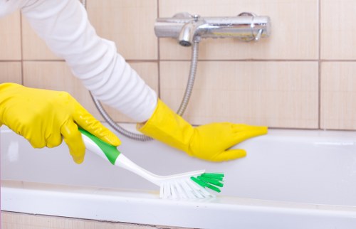 Professional cleaner working in a living room