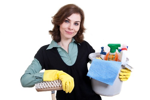 Cleaner performing a detailed one off clean in a Barnet property