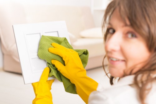 Staff separating cleaning waste into recyclable streams